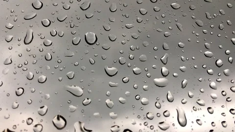 Closeup view of rain drops on glass. Stock Footage 107632296
