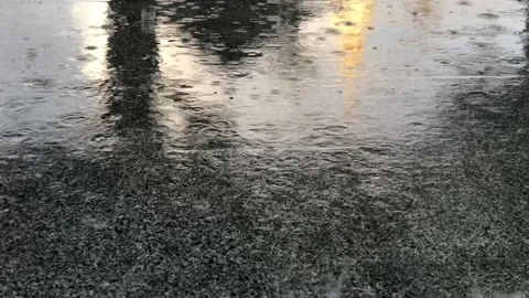 Closeup view of rain drops on a granite floor Видео 147211527