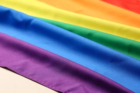 Closeup view of rainbow flag as background. LGBT concept Stock Photos