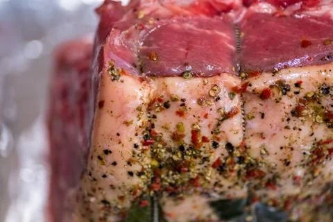 Closeup view raw beef cross rib chunk on oven tray with foil Stock-Fotos