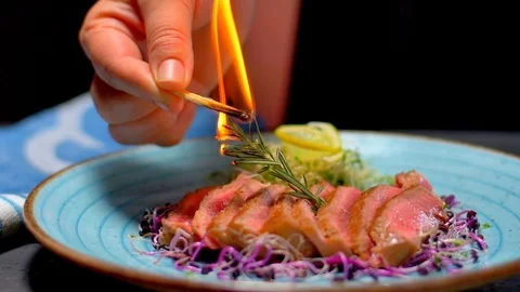 Closeup view of raw uncooked slice of meat and fresh vegetables with flames. bbq Stock Footage 123076415