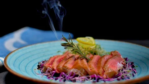 Closeup view of raw uncooked slice of meat and fresh vegetables with flames. bbq Video stock 123076591