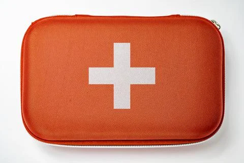 Closeup view of a red bag of a first aid kit isolated over a white backgrou.. Stock Photos