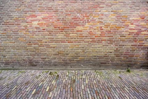 Closeup view of the red floor and wall. Abstract pattern of a brick wall an.. Stock Photos