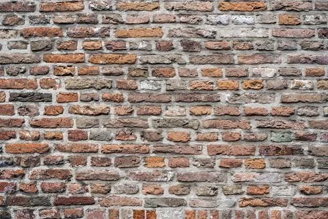 Closeup view of the red wall. Abstract pattern of a brick wall Stock Photos