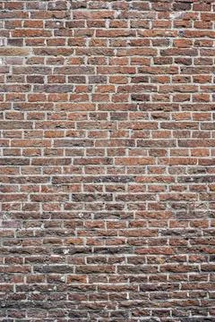 Closeup view of the red wall. Abstract pattern of a brick wall Stock Photos