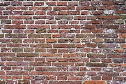 Closeup view of the red wall. Abstract pattern of a brick wall Stock Photos