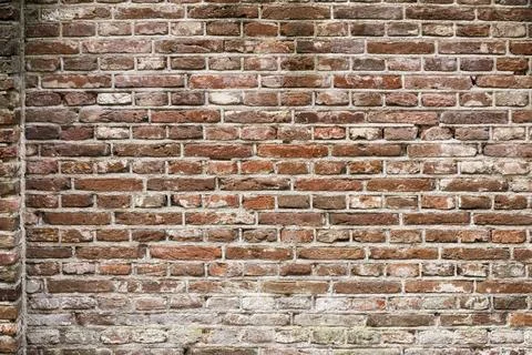 Closeup view of the red wall. Abstract pattern of a brick wall Stock Photos