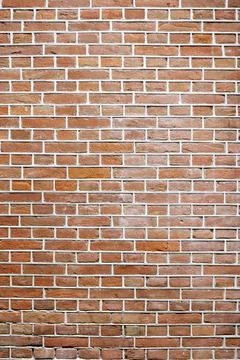 Closeup view of the red wall. Abstract pattern of a brick wall Stock Photos
