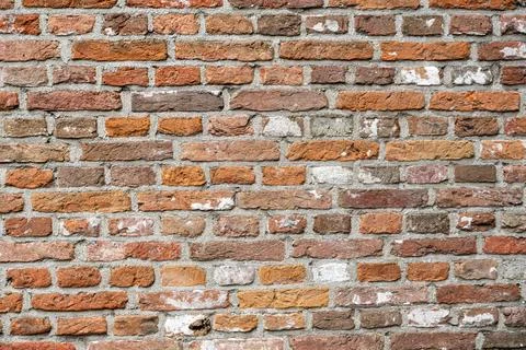 Closeup view of the red wall. Abstract pattern of a brick wall Stock Photos