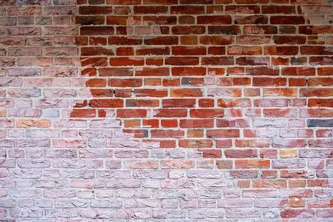 Closeup view of the red wall. Abstract pattern of a brick wall Stock Photos