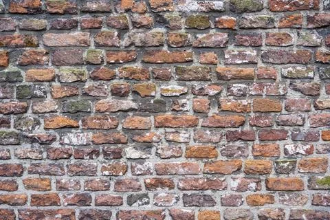 Closeup view of the red wall. Abstract pattern of a brick wall Stock Photos