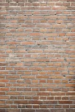 Closeup view of the red wall. Abstract pattern of a brick wall Foto stock