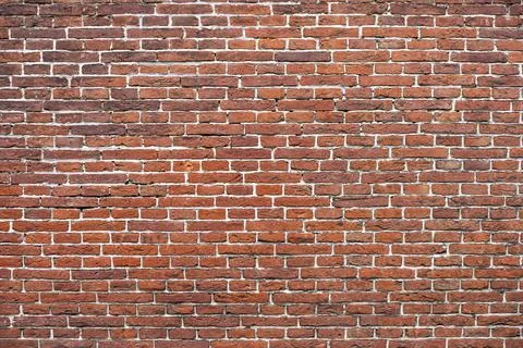 Closeup view of the red wall. Abstract pattern of a brick wall Stock Photos