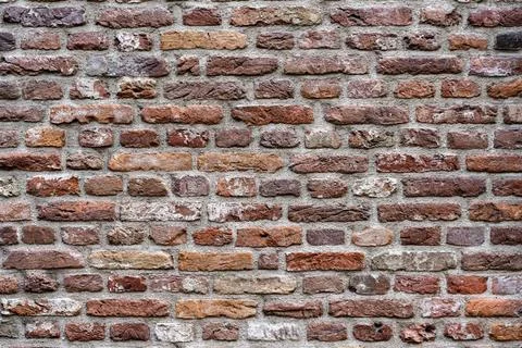 Closeup view of the red wall. Abstract pattern of a brick wall Stock Photos