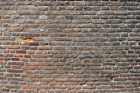 Closeup view of the red wall. Abstract pattern of a brick wall Stock Photos