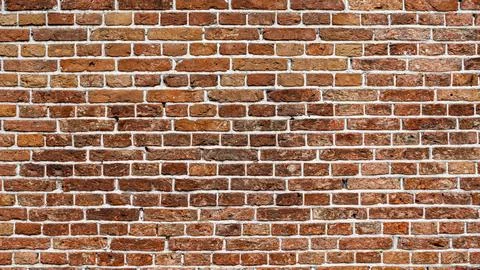 Closeup view of the red wall. Abstract pattern of a brick wall Stock Photos