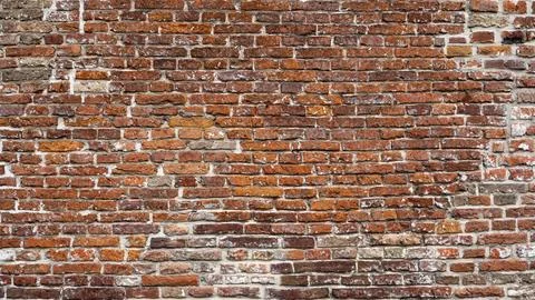 Closeup view of the red wall. Abstract pattern of a brick wall Stock Photos