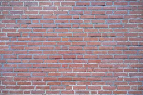 Closeup view of the red wall. Abstract pattern of a brick wall Stock Photos