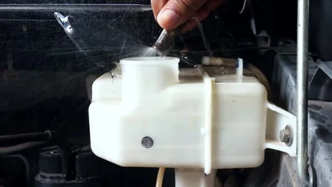 A closeup view from refilling a car with fresh water. Stock Footage 154564050