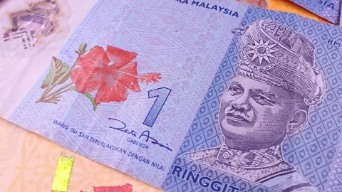 Closeup view of rotating brand new Malaysian ringgit (MYR) banknotes. Stock Footage 297145495