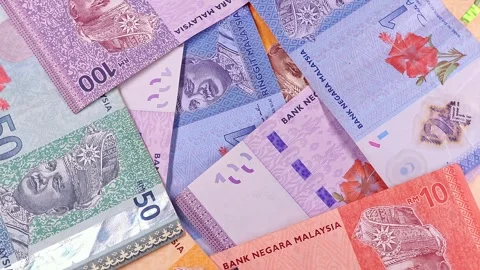 Closeup view of rotating brand new Malaysian ringgit (MYR) banknotes. Stock Footage 297156659