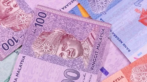 Closeup view of rotating brand new Malaysian ringgit (MYR) banknotes. Stock Footage 297162611