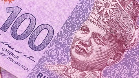Closeup view of rotating brand new Malaysian ringgit (MYR) banknotes. Stock Footage 297164089