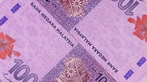 Closeup view of rotating brand new Malaysian ringgit (MYR) banknotes. Stock Footage 297167863
