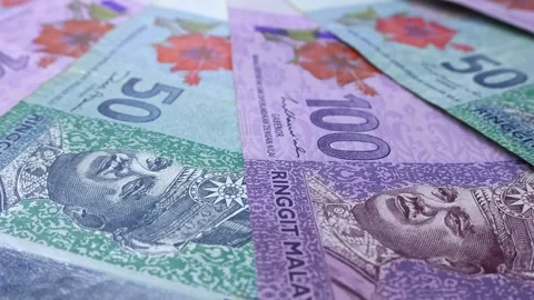 Closeup view of rotating brand new Malaysian ringgit (MYR) banknotes. Stock Footage 308022331