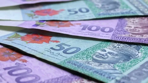 Closeup view of rotating brand new Malaysian ringgit (MYR) banknotes. Stock Footage 308022452