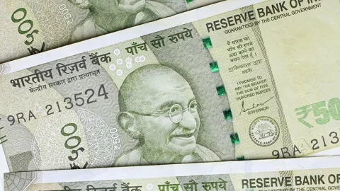 Closeup view of rotating brand new Indian rupee (INR) banknotes. Stock Footage 308022545