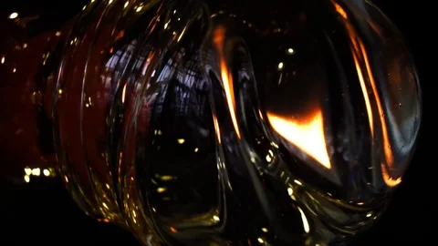 Closeup View of Rotating Liquid Glass Stock Footage 108991722