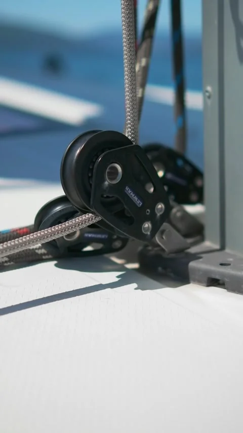 Closeup view of sailing equipment highlighting pulleys, ropes for boating Stock Footage 284971435