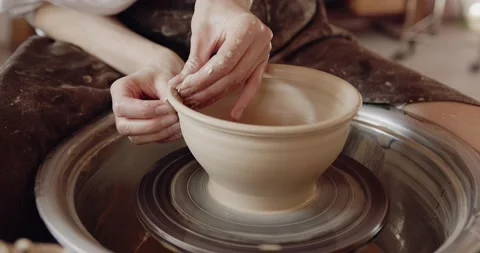 Closeup view of the sculptor in workshop makes jug out of clay Stock Footage 207069743