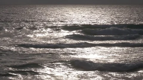 Closeup view of sea waves in silver colors. Seascape view with blinding light 4k 스톡 동영상 72117243