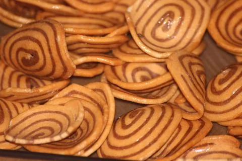 Closeup view with selective focus of a large number of round cookies Stock Photos