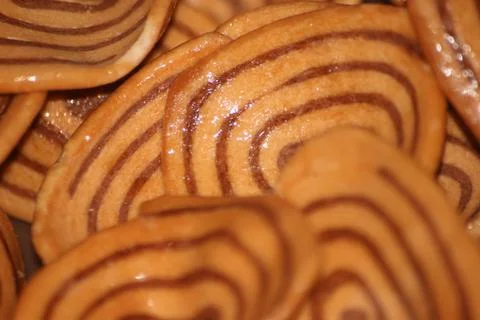 Closeup view with selective focus of a large number of round cookies Stock Photos