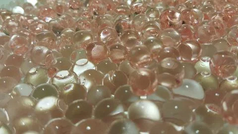 Closeup view with selective focus of shiny glittering orbeez or colorful wate Foto stock