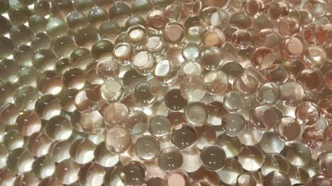 Closeup view with selective focus of shiny glittering orbeez or colorful wate Foto stock