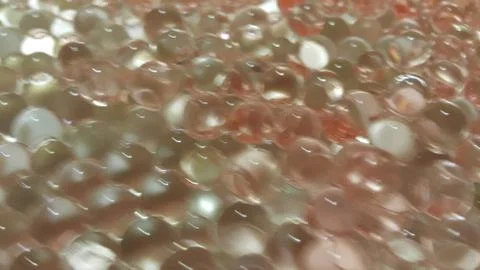 Closeup view with selective focus of shiny glittering orbeez or colorful wate Foto stock
