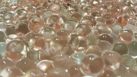Closeup view with selective focus of shiny glittering orbeez or colorful wate Foto stock