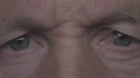 Closeup view of senior crop man with beautiful blue eyes. Video stock 148283199