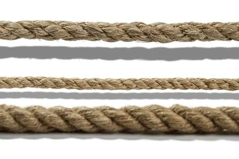 Closeup view set of various straight ropes string isolated over white backg.. Foto stock