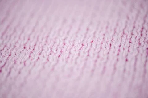 Closeup view showcasing the delicate Soft Pink Knit Fabric Texture in great.. Stock Photos