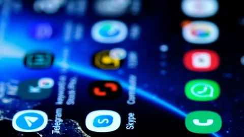 Closeup view of Skype App Launching On Smartphone,video call connection service Stock Footage 126757760