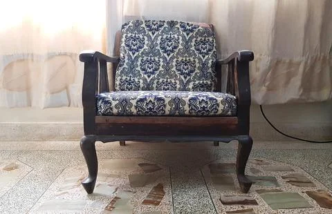 Closeup view of a sofa or an old wooden armchair Stock Photos