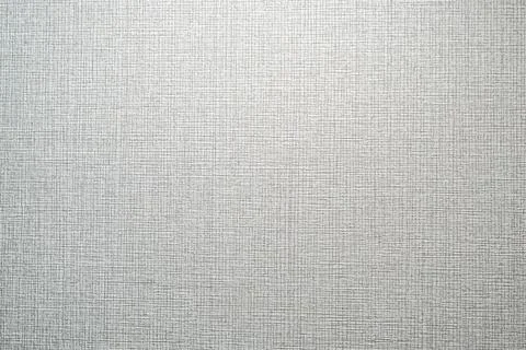 Closeup view of soft gray fabric texture forming seamless neutral background Stock Photos