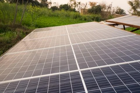 Closeup view of solar panels installed in fields - green energy Stock-Fotos