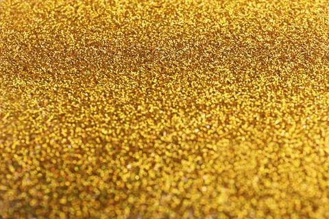 Closeup view of sparkling golden glitter background Stock Photos